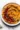 10-Minute Cozy and Creamy Pumpkin Hummus served in a bowl
