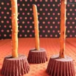 Plate of festive Halloween food ideas including spooky snacks and treats.