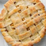 Delicious homemade apple pie with flaky crust and cinnamon-spiced apples