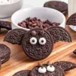 Homemade Bat Oreos decorated for Halloween with chocolate and sprinkles