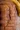 Slice of homemade moist banana bread on a wooden table