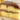 Delicious slice of Boston Cream Pie with cake layers and chocolate icing
