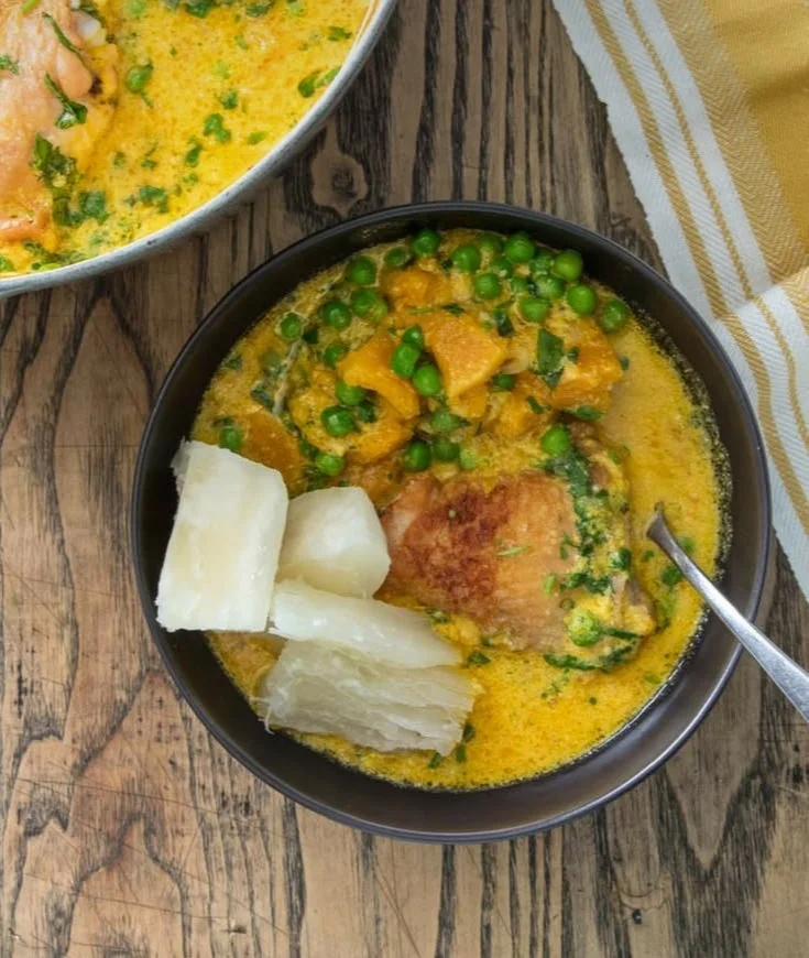 Braised chicken with yellow chile and coconut milk served on a plate