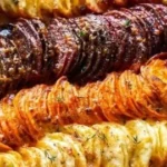 Cheesy root vegetable gratin topped with melted cheese and herbs