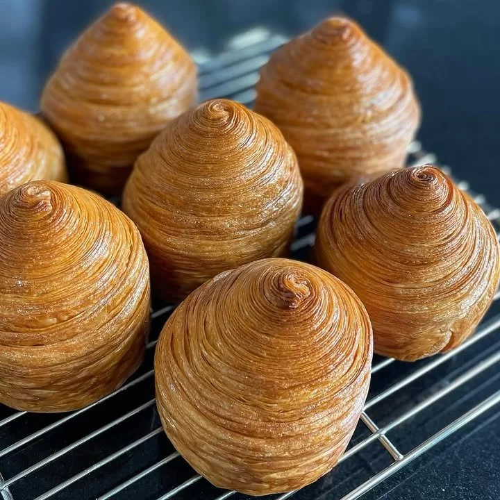 Golden, flaky croissant freshly baked by Chef Broich