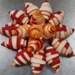 Deliciously golden croissant pastry expertly crafted by Chef Broich.