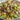 Chickpea Feta Avocado Salad garnished with fresh herbs and vegetables