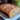 Freshly baked cinnamon donut bread with a sweet glaze