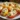 Cold stuffed mini peppers filled with cream cheese on a serving platter