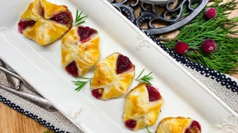 Delicious cranberry brie bites served on a platter for a festive occasion