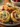 Cranberry Cream Cheese Pinwheels with feta and herbs on a platter