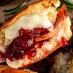 Cranberry Turkey Sliders served on a platter with fresh garnishes