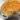 Creamy baked macaroni and cheese in a dish with a golden, cheesy crust