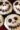 Creepy Halloween skull cupcakes decorated with spooky designs for festive treats.