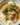Delicious Crockpot Coconut Lime Chicken served with fresh lime slices and herbs.