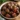 Crockpot grape jelly meatballs served in a dish, showcasing a tasty appetizer.