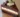 Decadent triple chocolate mousse cake with layers of rich chocolate and whipped cream