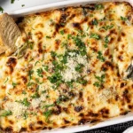 Delicious easy spinach artichoke dip served with tortilla chips