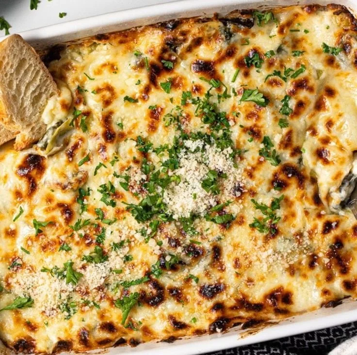 Delicious easy spinach artichoke dip served with tortilla chips