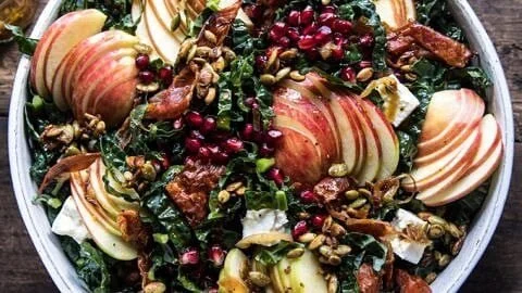 Fall Harvest Honeycrisp Apple and Kale Salad served in a bowl