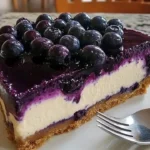 Delicious fresh blueberry cheesecake topped with ripe blueberries