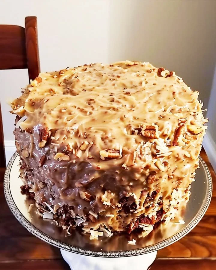 Deliciously moist German Chocolate Pound Cake topped with chocolate and pecans