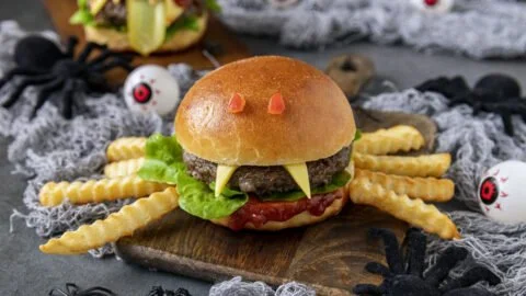 Halloween burgers decorated with spooky toppings for a festive treat