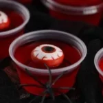 Halloween eyeball jello shots served in clear cups
