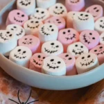 Halloween marshmallows featuring spooky skeleton designs