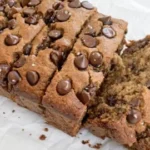 Healthy chocolate chip banana bread loaf with bananas and chocolate chips