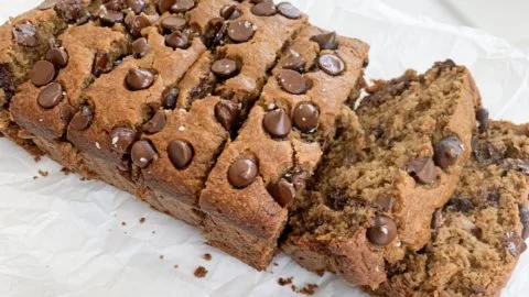 Healthy chocolate chip banana bread loaf with bananas and chocolate chips