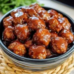 Delicious Honey BBQ Crockpot Meatballs in a serving dish.