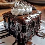 Hot Fudge Chocolate Cake with rich chocolate frosting and fudge drizzle