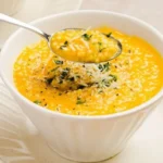 Bowl of Italian Penicillin Soup garnished with herbs and ingredients