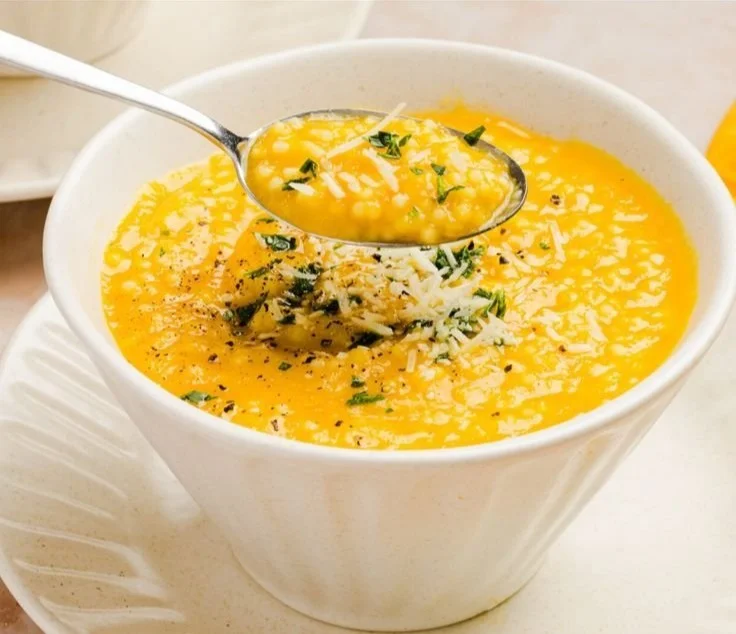 Bowl of Italian Penicillin Soup garnished with herbs and ingredients