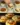 Mediterranean stuffed mashed potato nests garnished with herbs and spices