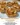 Mini apple and cinnamon tarts served on a plate