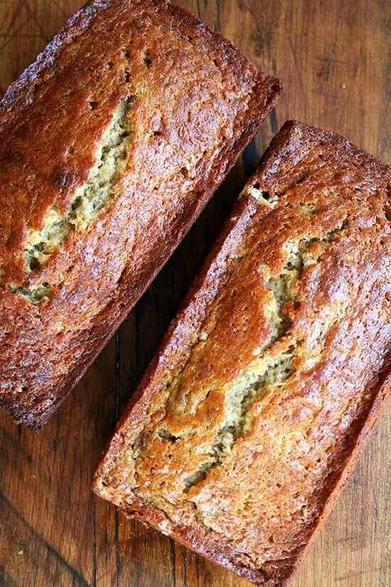 Delicious slice of Mrs. Myers' banana bread on a wooden table