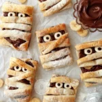 Delicious Nutella Mummy Hand Pies for Halloween celebrations