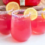 Delicious Pink Party Punch with sherbet in a festive glass