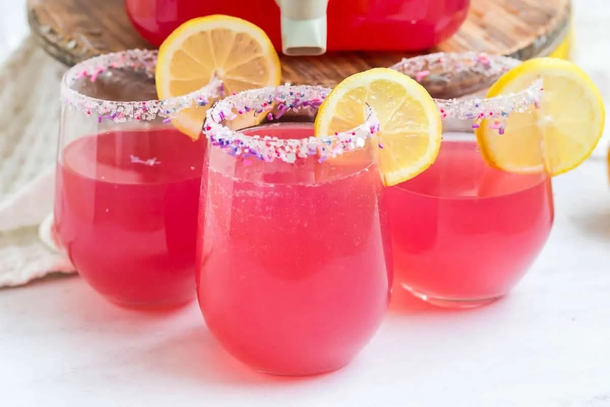 Delicious Pink Party Punch with sherbet in a festive glass