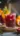 Refreshing Pomegranate Passion Fruit Punch Mocktail garnished with fresh fruit