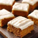 Delicious homemade pumpkin bars topped with cream cheese frosting