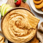 Delicious pumpkin pie dip served with graham crackers and whipped cream