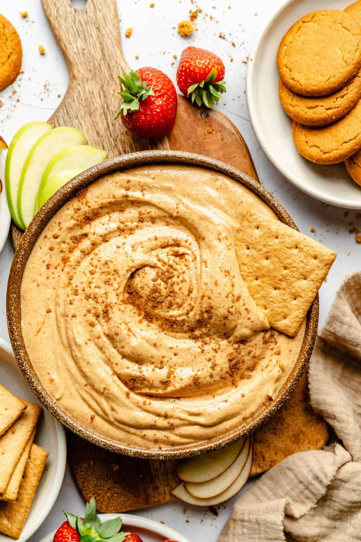 Delicious pumpkin pie dip served with graham crackers and whipped cream