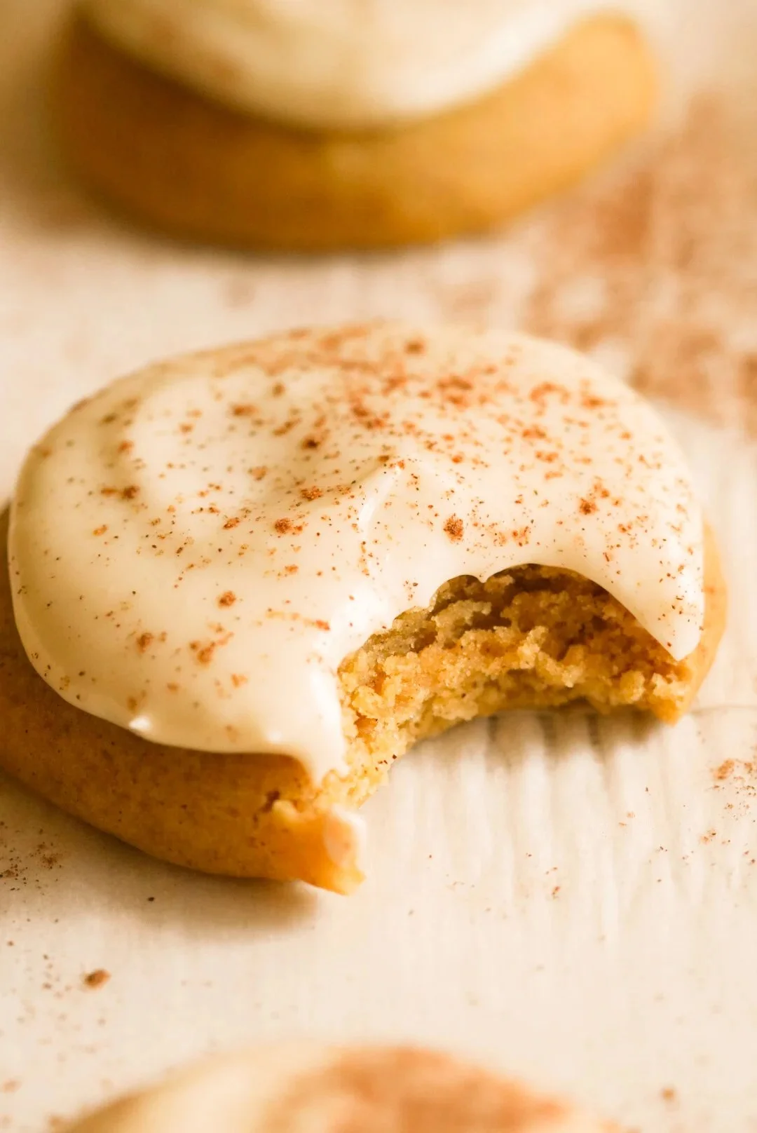 Pumpkin spice sugar cookies decorated with cream cheese frosting