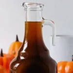 Bottle of pumpkin spice syrup for enhancing coffee and tea drinks