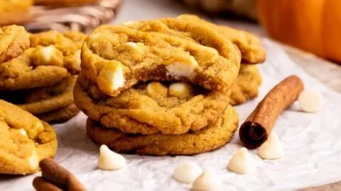 Delicious pumpkin white chocolate chip cookies on a baking tray