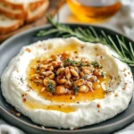 Delicious ricotta dip topped with hot honey served with crackers