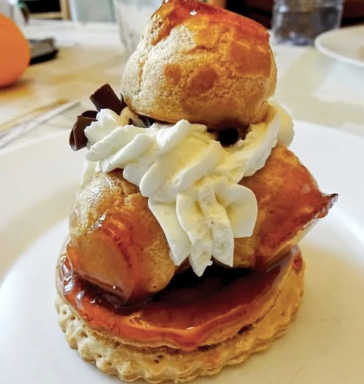 Delicious Saint-Honoré Cake with cream puffs and pastry cream